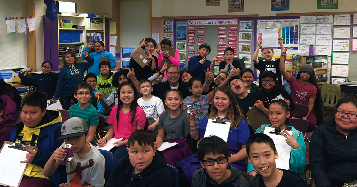 Mentor Hal Neace surrounded by kids in Brett Stevens’ fifth-grade class in in Utqiaġvik. Mentor Hal Neace surrounded by kids in Brett Stevens’ fifth-grade class in in Utqiaġvik.