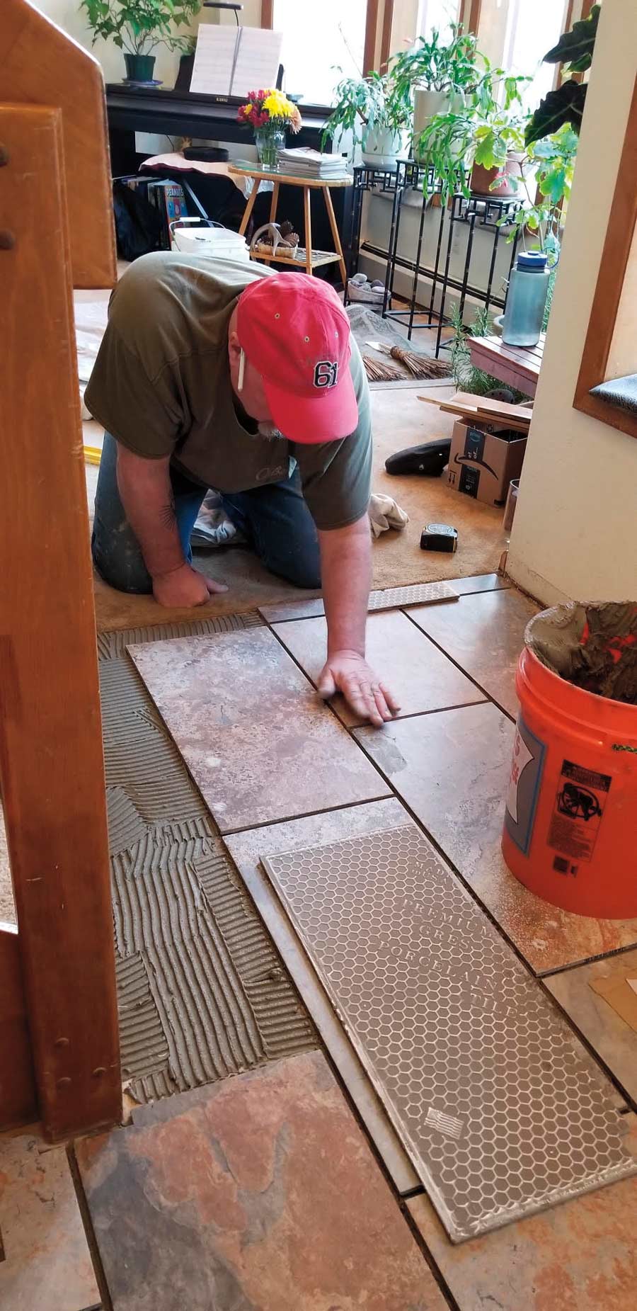 man working tile