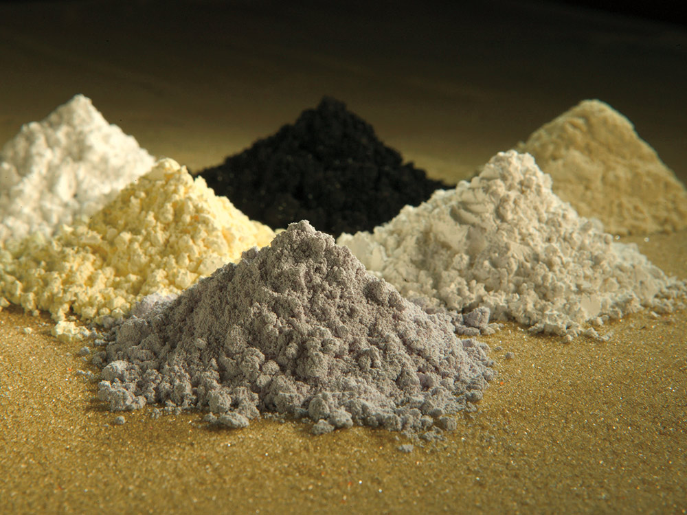 Picture of praseodymium, cerium, lanthanum, neodymium, samarium, and gadolinium rare-earth oxides.