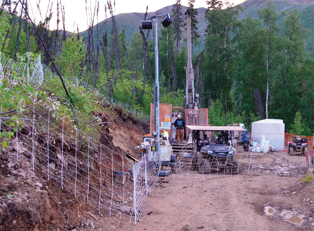 Millrock core drilling rig in action in central Alaska.