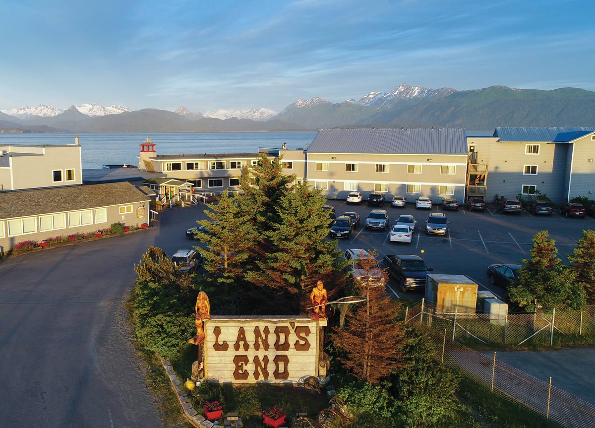 Land's End Resort with lake and mountains behind it