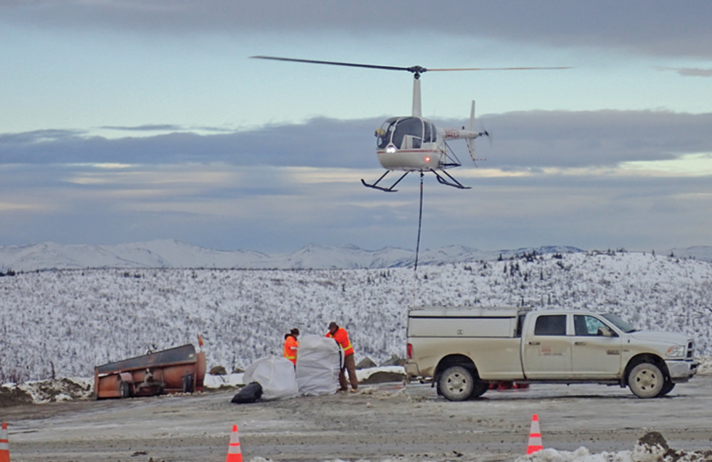 helicopter support aids geologists performing exploration work in the Goodpaster District