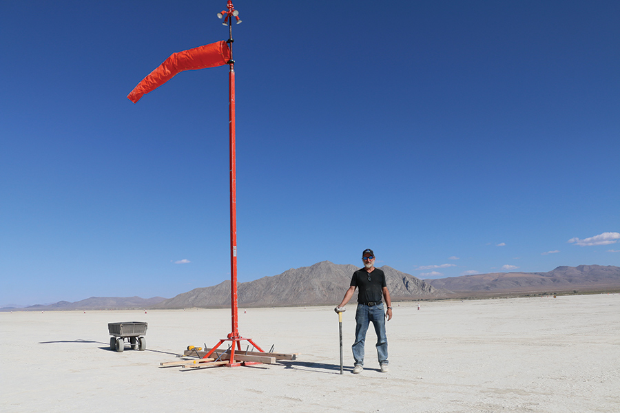 A GROL Electrician installing an airstrip in Black Rock City, Nevada
