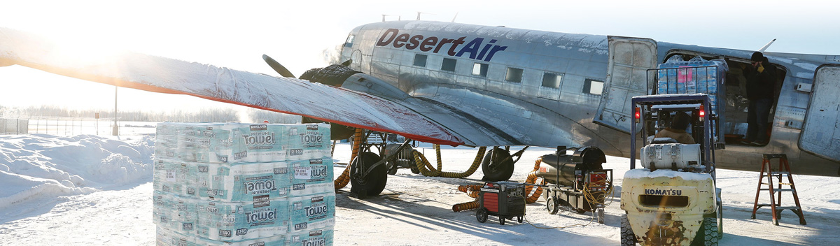 DesertAir plane being loaded with supplies