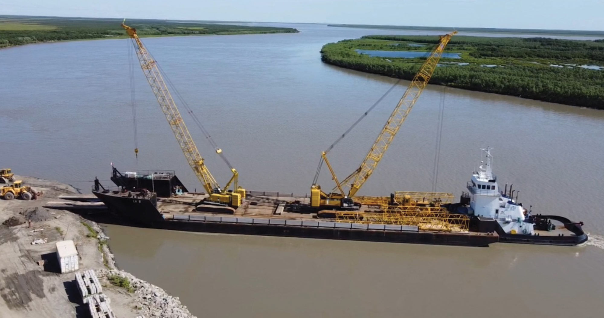 aerial view of a crane barged to Emmonak
