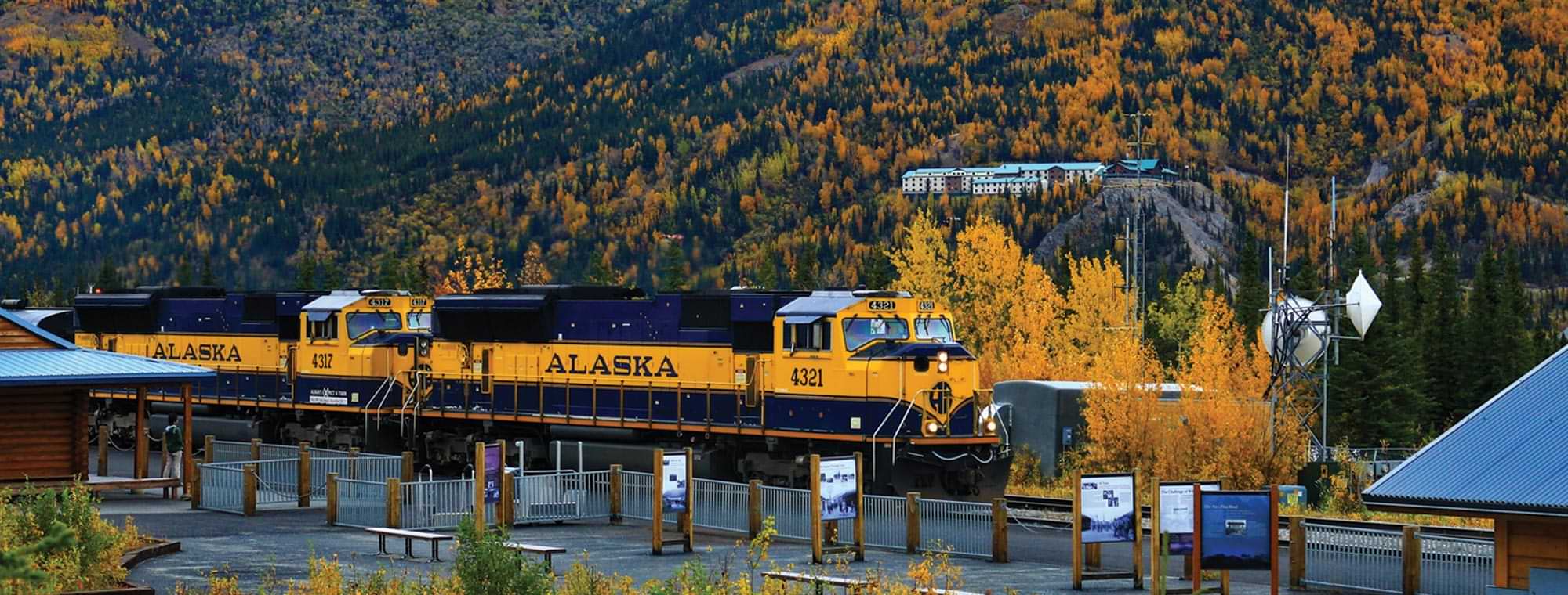 an Alaska Railroad train coming into a depot