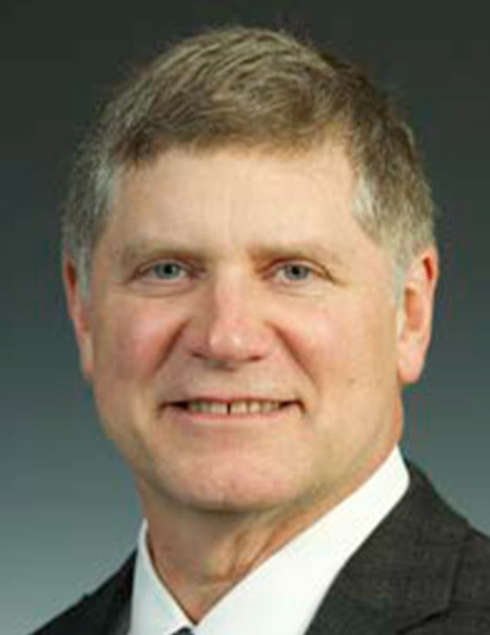 Heimke in a suit and ties