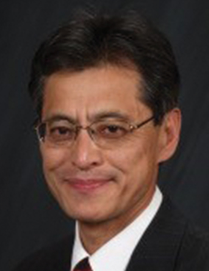 Ogawa in a suit and tie