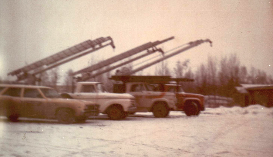 Vintage photo of lined up trucks