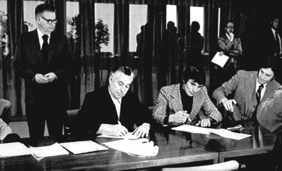Bristol Bay Native Corporation’s first President, Harvey Samuelsen, and Hjalmar Olson, another longtime leader of BBNC, sign papers