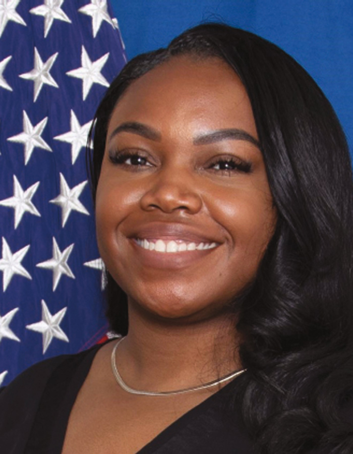 A headshot photograph of Krystle Burns smiling (Chief of Workforce Management at US Army Corps of Engineers - Alaska District)