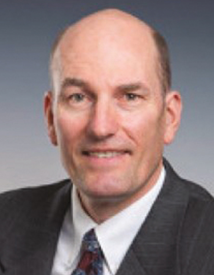 A headshot photograph of Kenneth Gutsch smiling (Attorney at Richmond & Quinn)