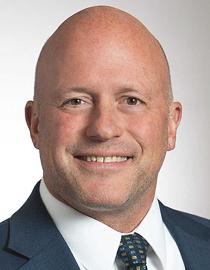 A headshot photograph of Doug Ladenburger smiling (Vice President, Director of Treasury Management Services at Northrim Bank)