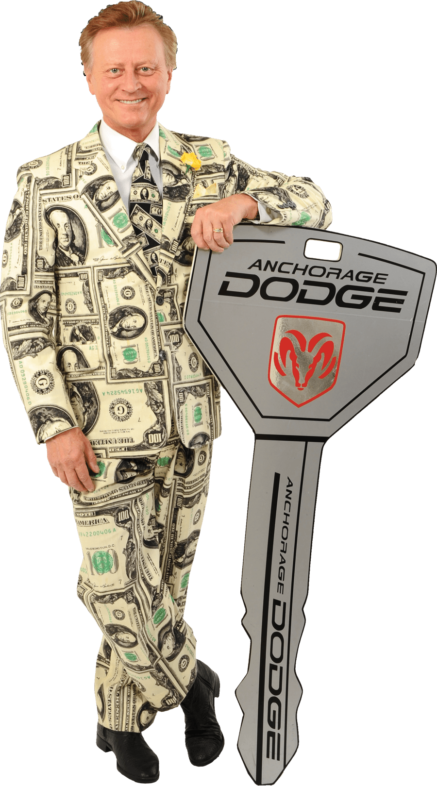 Man in a money suit standing next to key