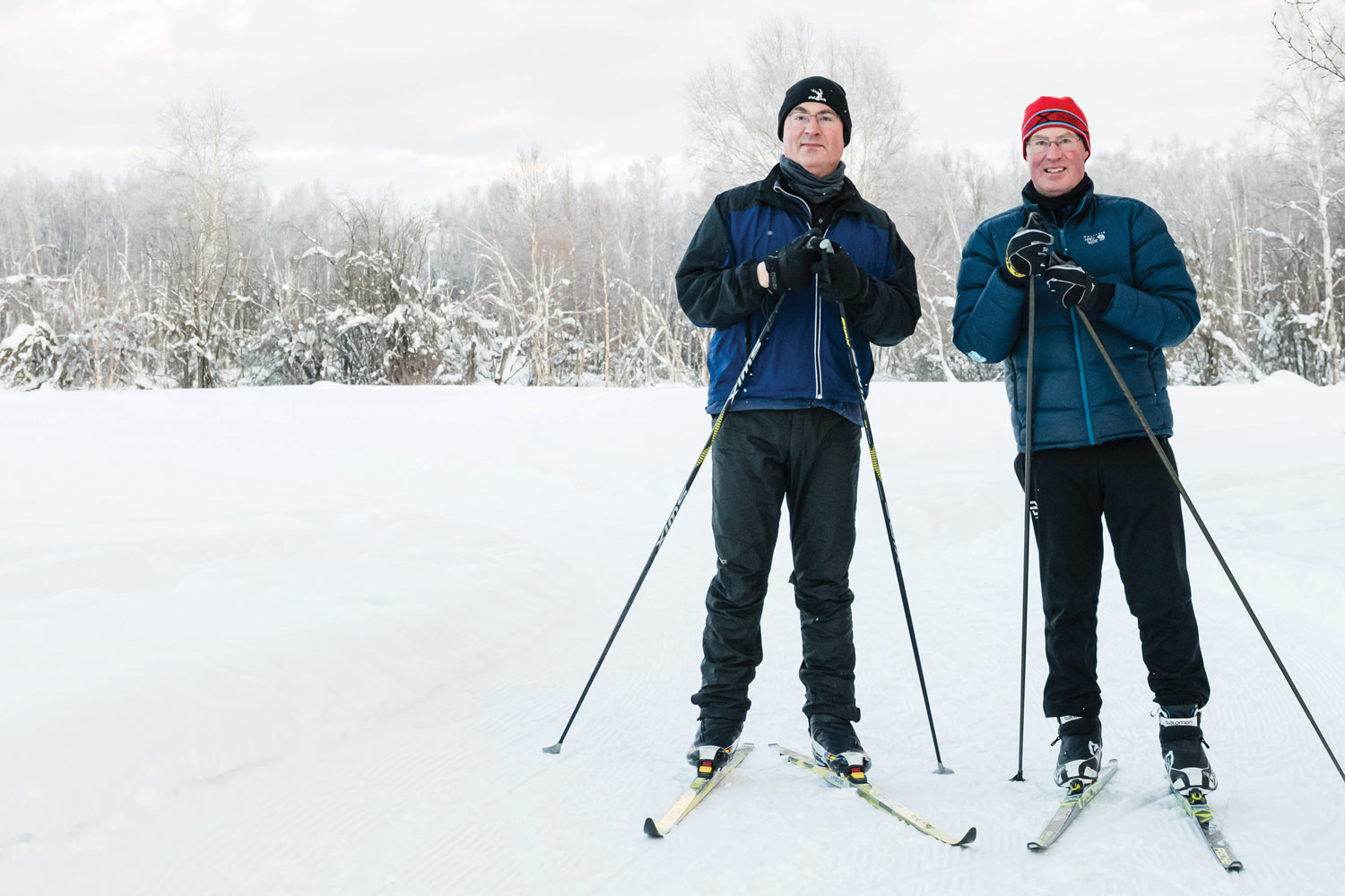 David & Jon Underwood posing together on skis