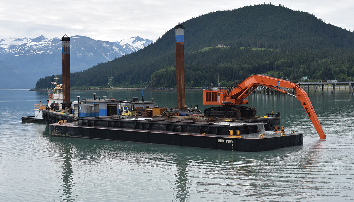 a dredging boat on the water