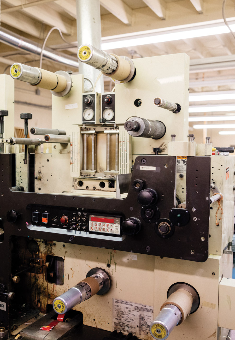 cream colored machine with black display panel