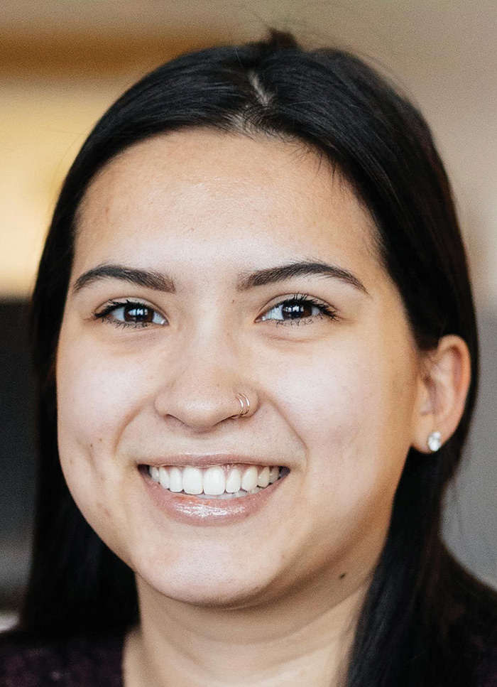 A photograph of Malia Barto smiling (Junior Account Executive at Blueprint Alaska)