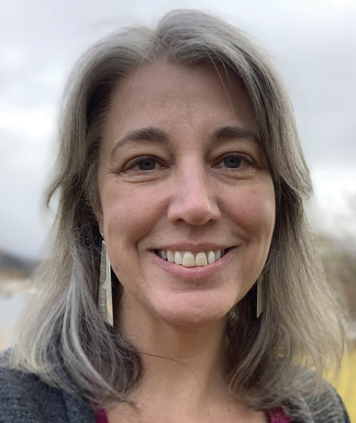 A photograph of Janelle Vanasse smiling (President of Alaska Pacific University)