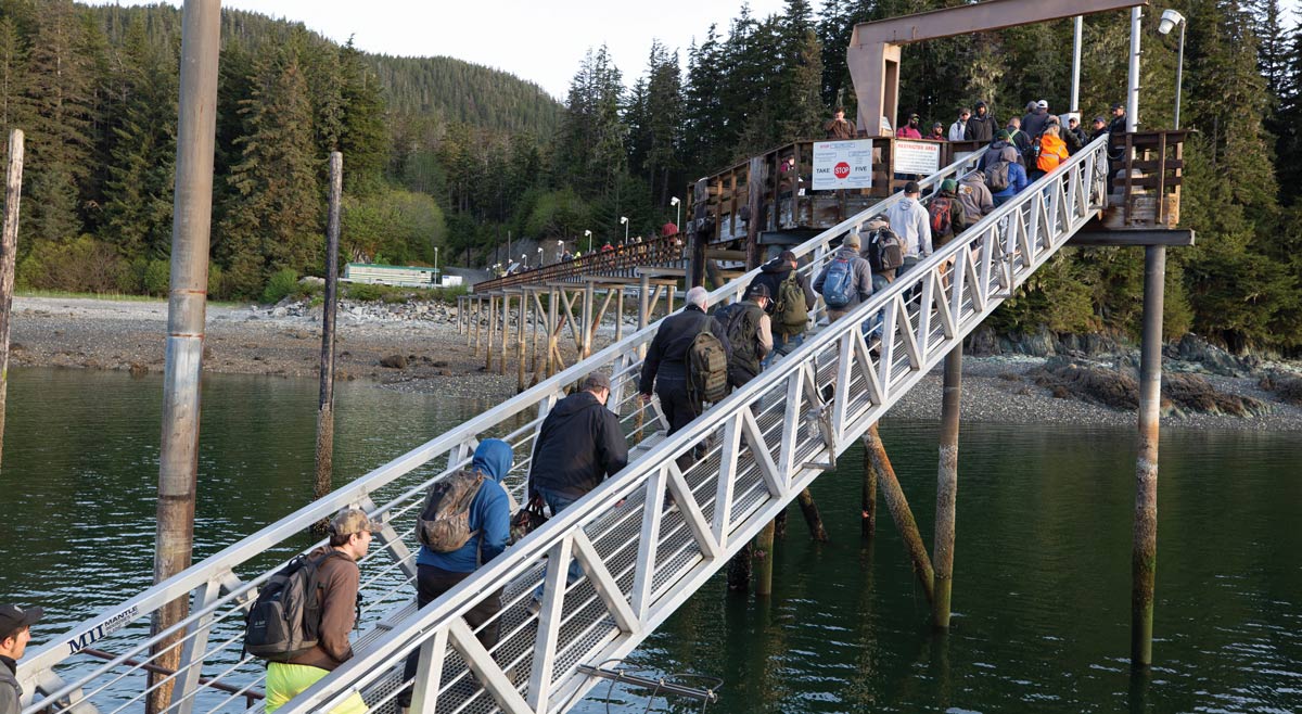 people walking on bridge