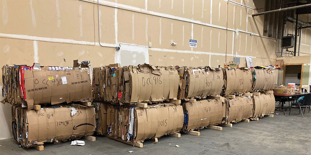 large cardboard and paper bales in recycling facility