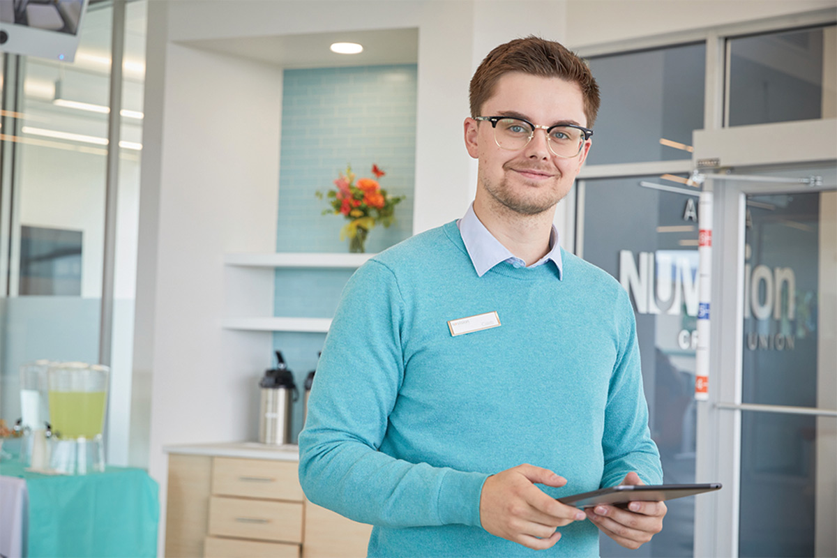 Nuvision Credit Union employee at store