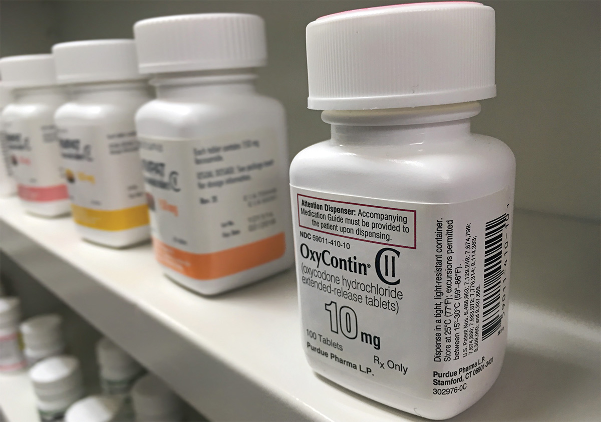 Bottle of OxyContin and other opioids on shelf