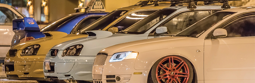 Cars in a line in a parking garage