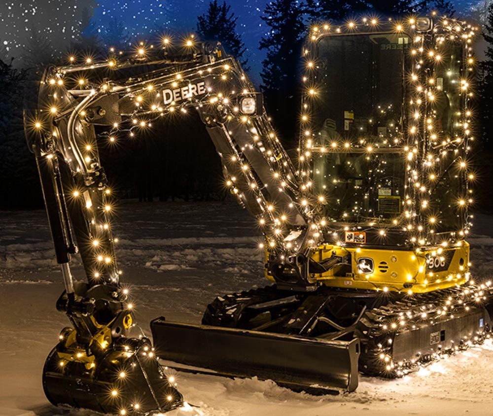 a John Deere tractor dressed in Christmas lights