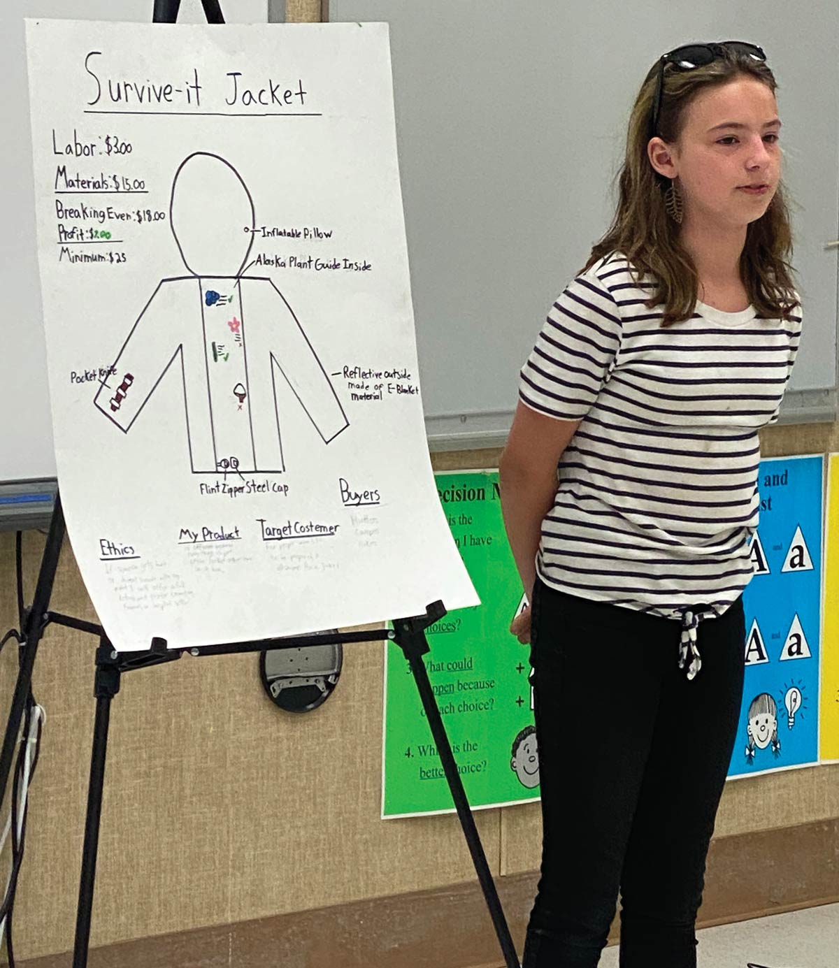 kid giving presentation for "Survive-it Jacket"