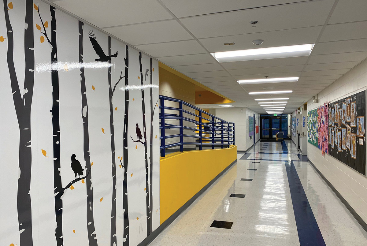 When Eagle River Elementary was rebuilt after the 2018 earthquake, BDS Architects told the building’s story through the use of the school’s traditional colors, blue and yellow, and symbols of eagles and birch trees.
