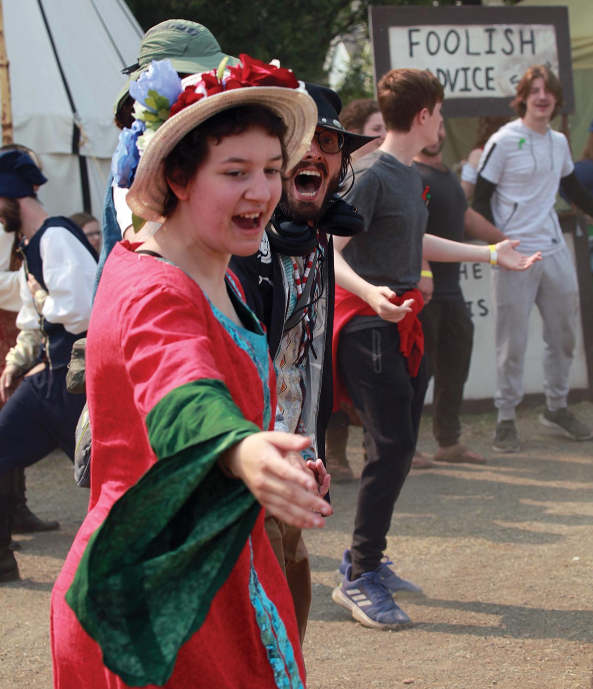 Smiles all around at Peasant Dancing and pretend violence at Fight Show, two of the eighteen performances staged each day of the fair.