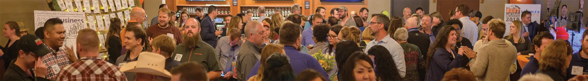 Group of people duing the best of alaska business event