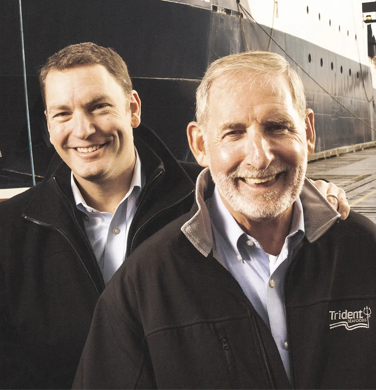 Joe and Chuck Bundrant, pictured with F/V Kodiak Enterprise. On April 8, 2023, the vessel caught fire at the Trident dock in Tacoma, Washington, and was declared a total loss. The company fleet includes three other trawl catcher-processors.