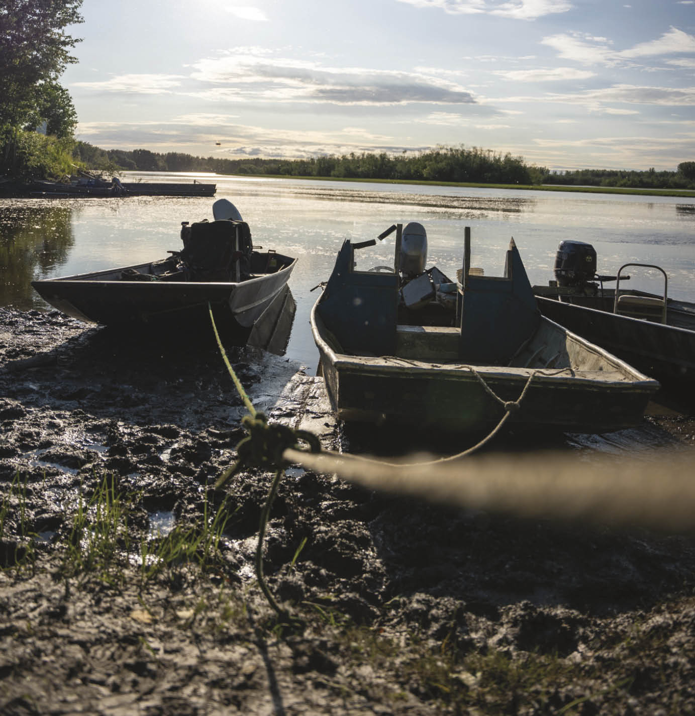 While subsistence fishing for Yukon River king and chum salmon is closed, fishing boats are idle on the shore.