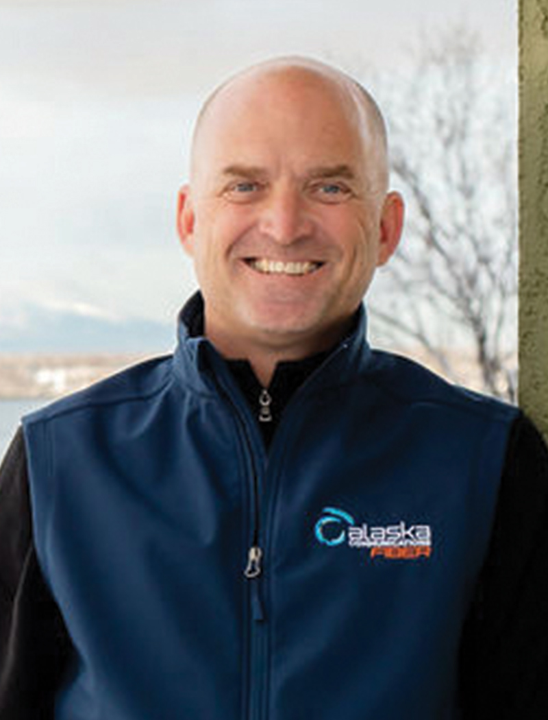 Headshot of a man wearing a blue fleece jacket (Matthew McConnell)