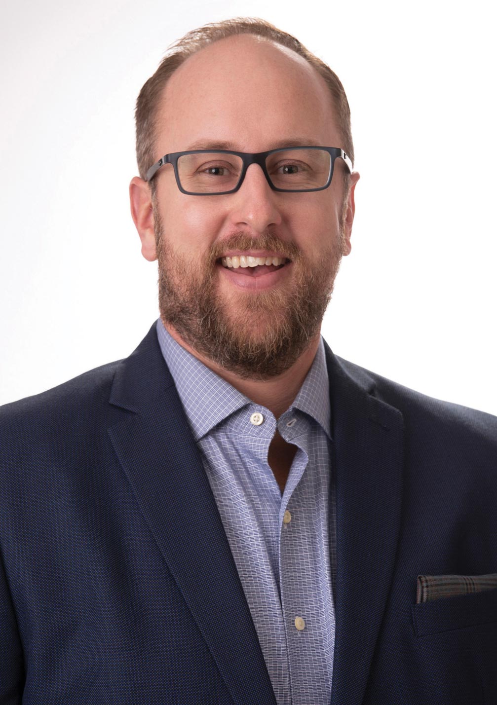 Ross' headshot, wearing a suit jacket and a purple button up jacket