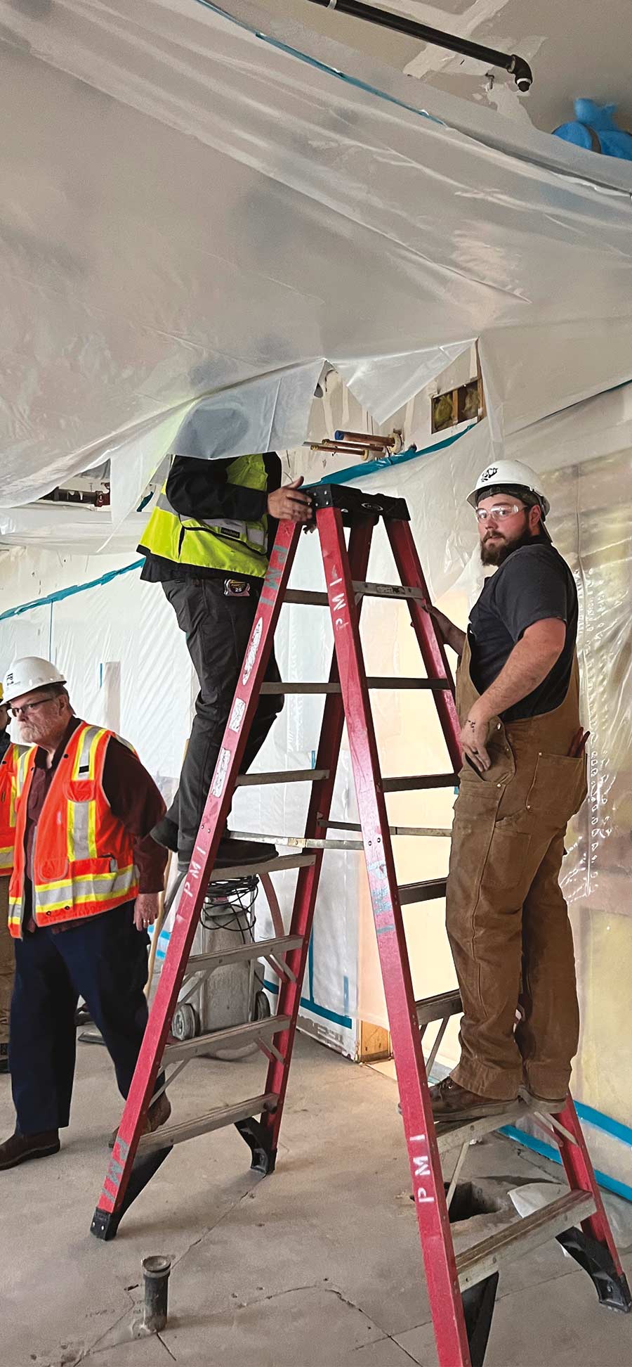 men performing a building inspection