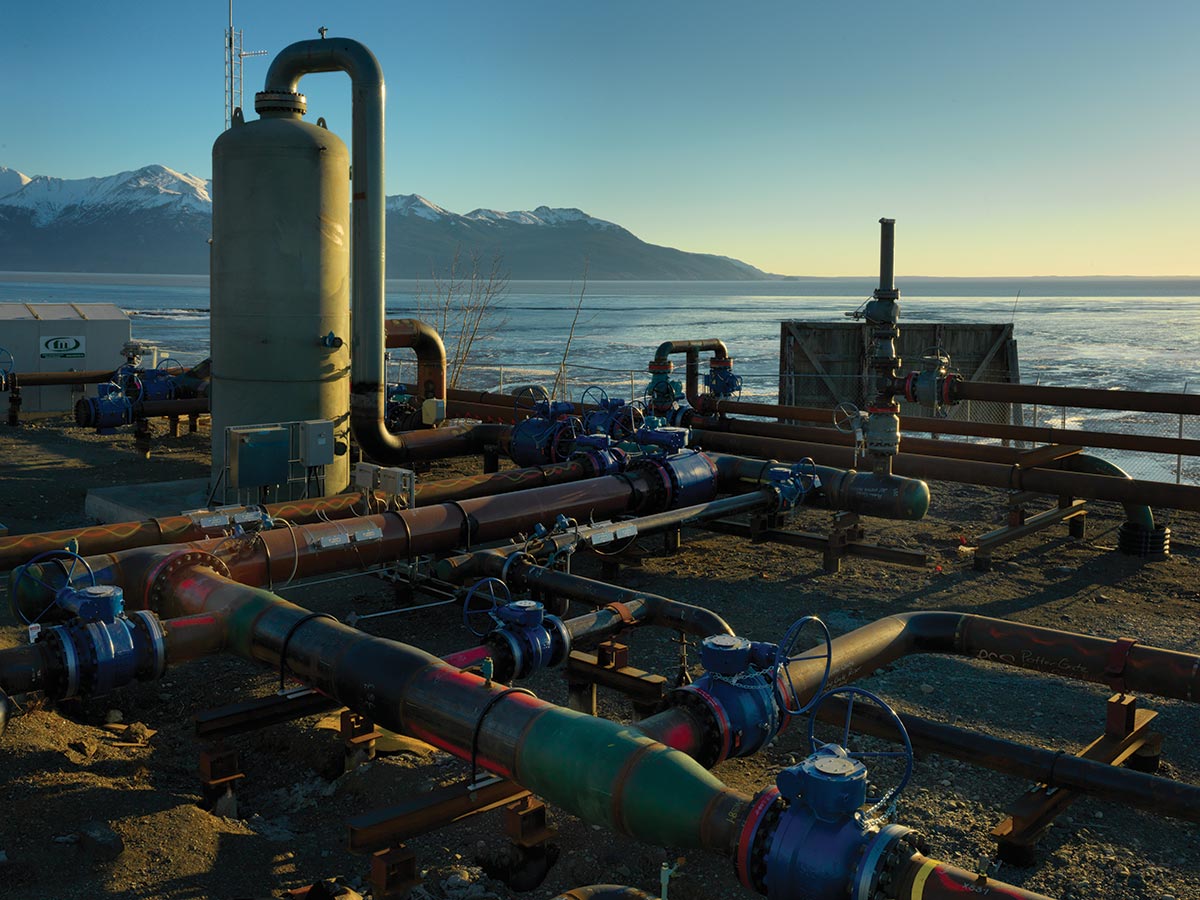 Aerial portrait photograph of pipelines at Potter Gate Station of Cook Inlet Natural Gas Storage Alaska (CINGSA) facility in Anchorage, Alaska during the day