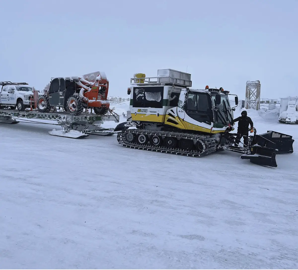 Hauling construction materials and equipment by PistenBully Snowcat allowed the Point Lay housing project to stay on schedule.