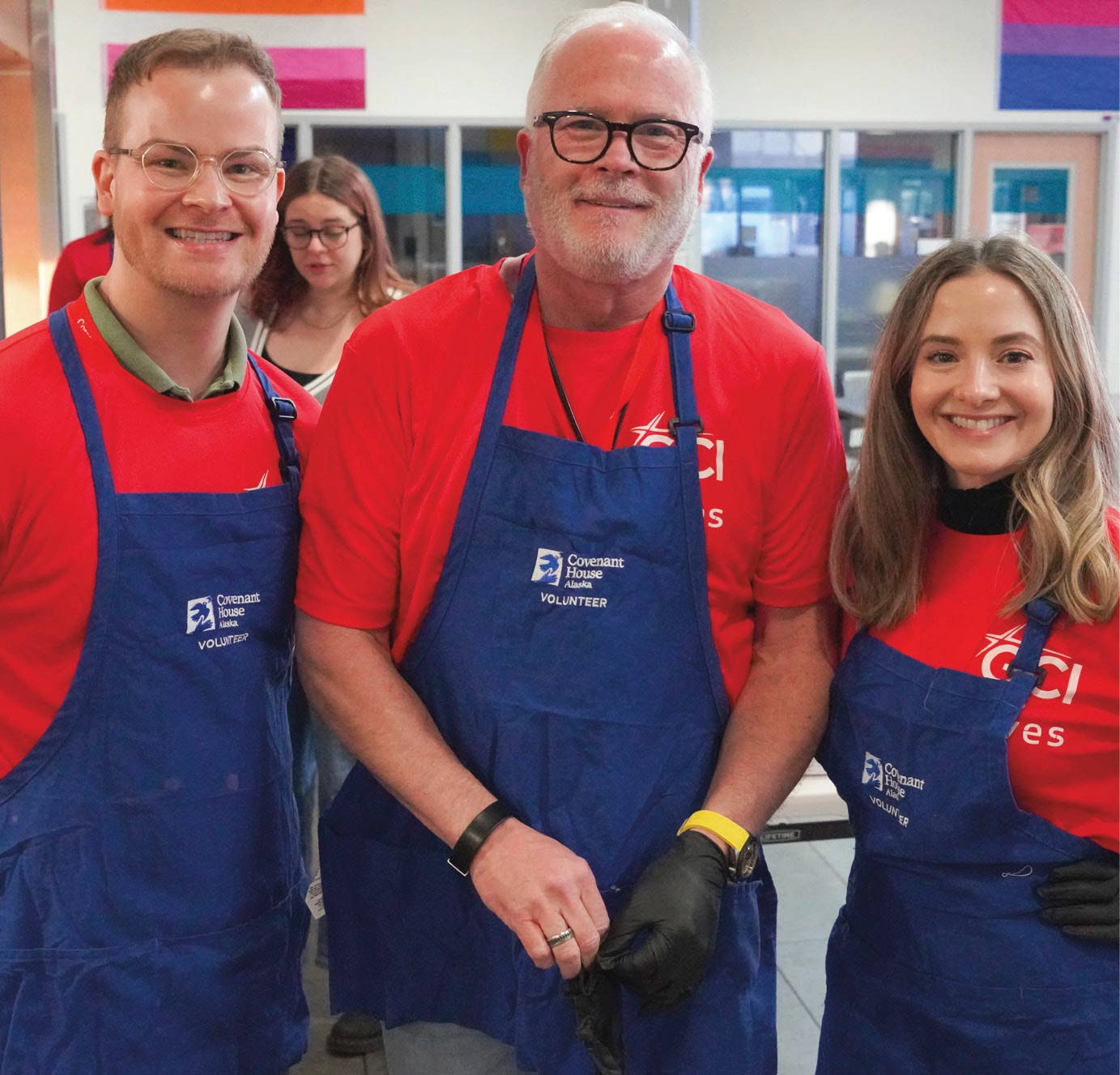 GCI employees smile in their uniforms