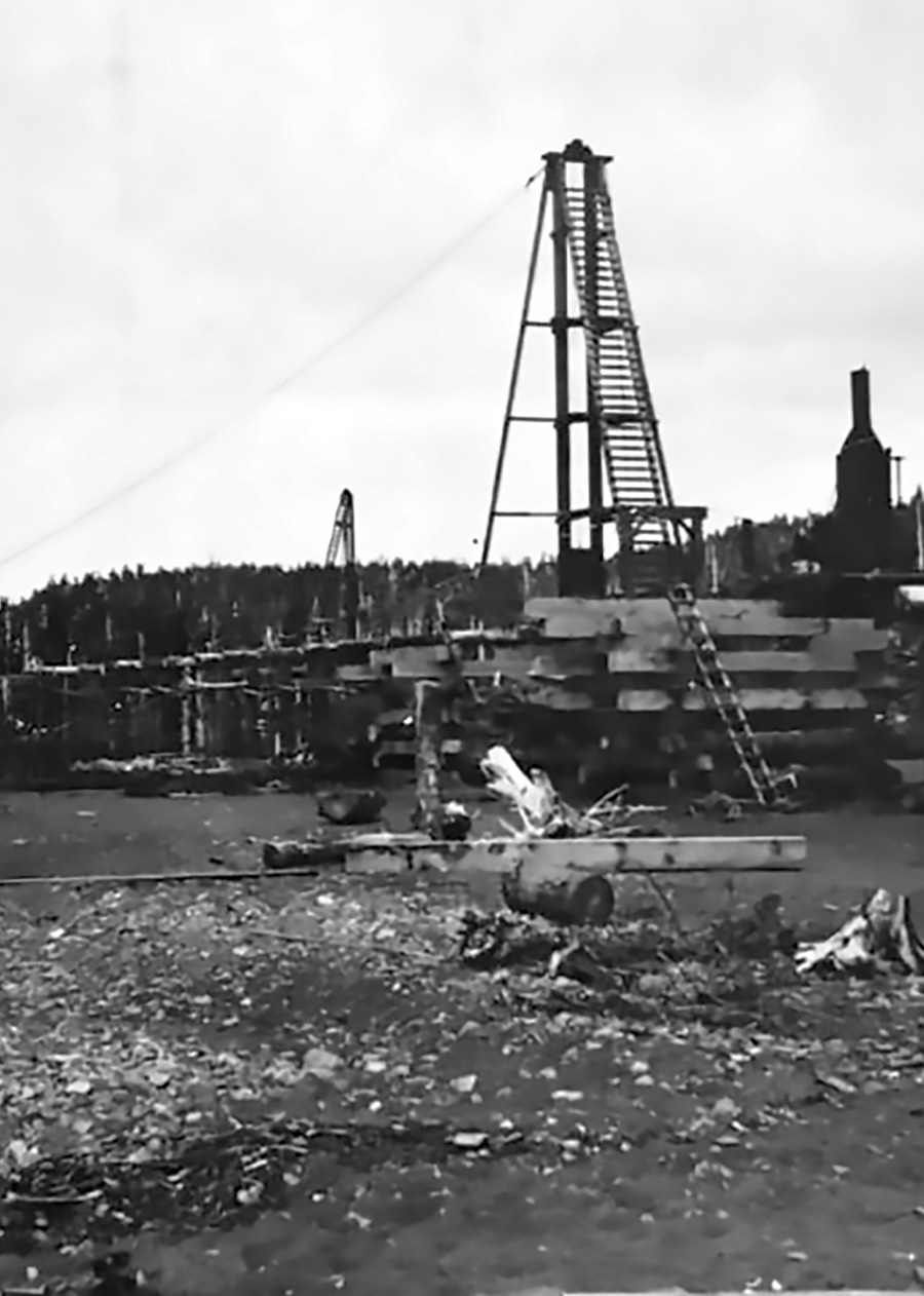 black and white photo of the first commercial oil production site in Alaska