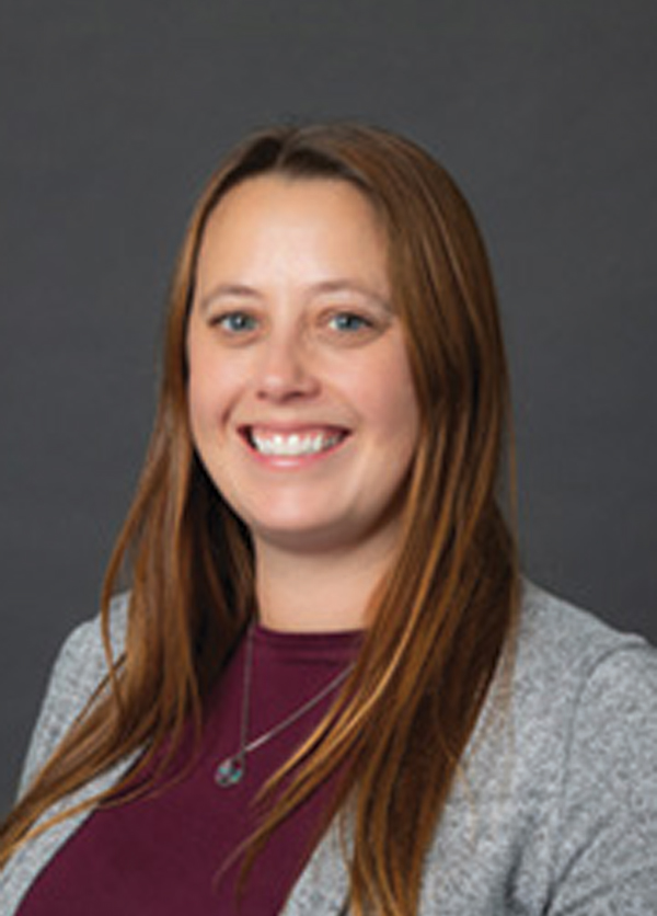 Portrait headshot photo of Gretchen Meyers smiling