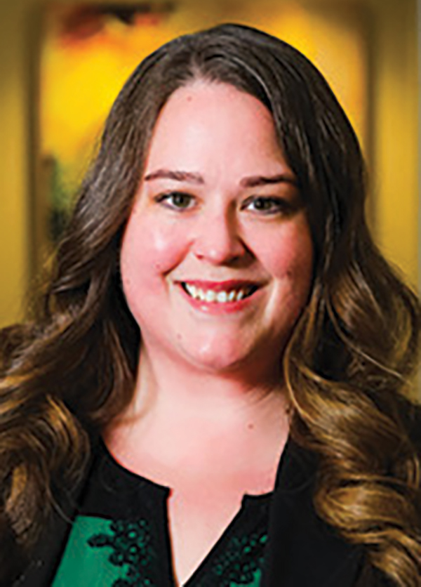 Portrait headshot photo of Katie Stachow smiling