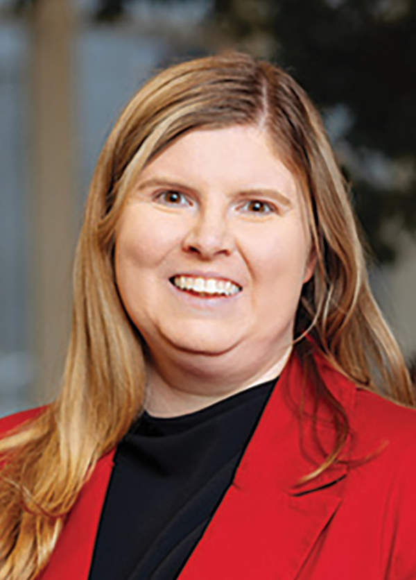 Portrait headshot photo of Suzanne Adler smiling