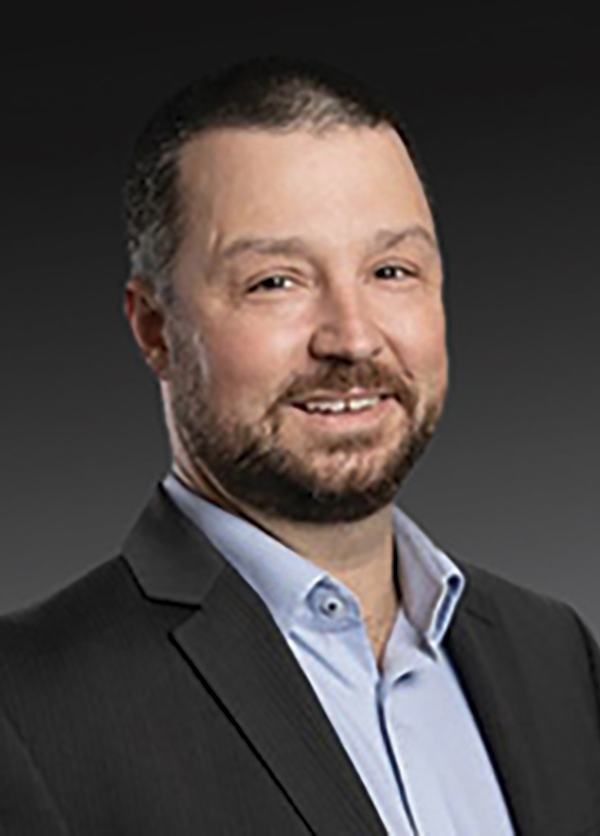 Portrait headshot photo of Todd Santangelo smiling