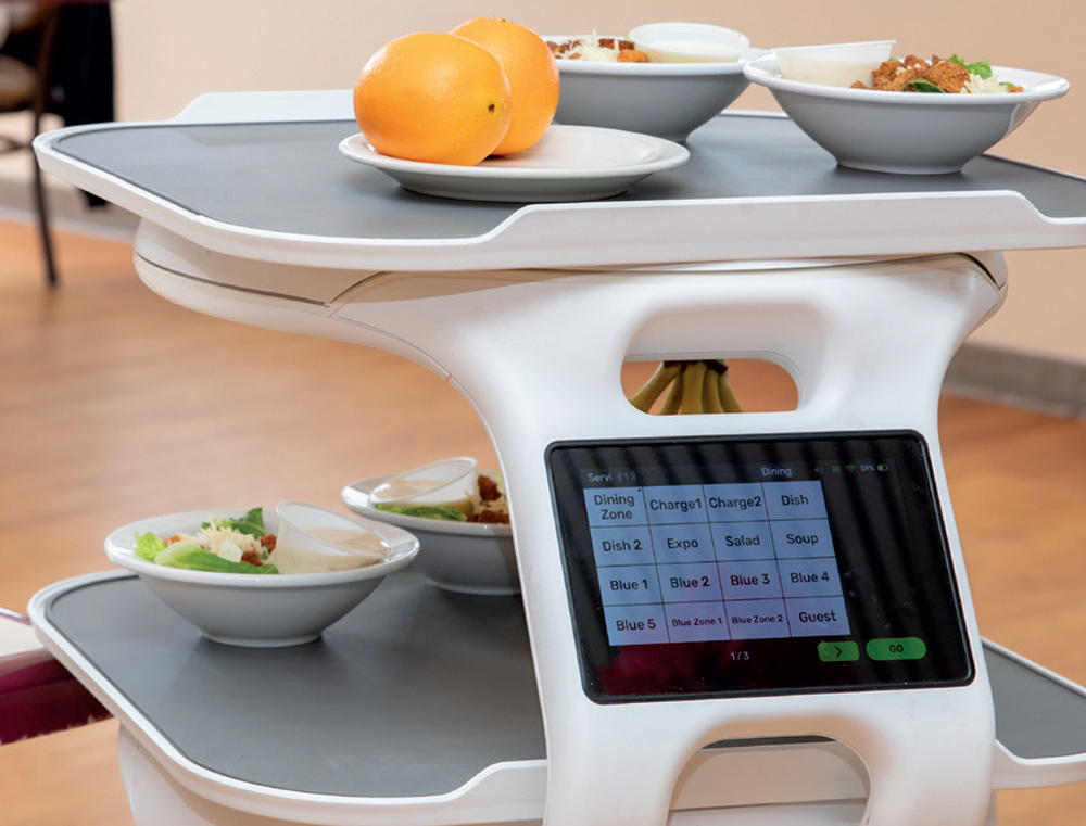 Servi Robot with food to take to tables