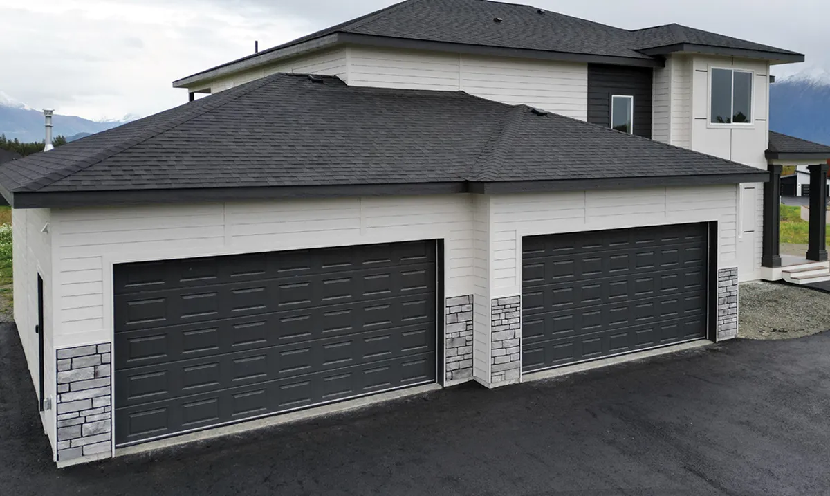 outdoor view of a house focusing on the garage doors