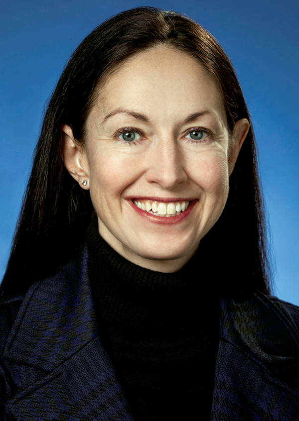 Portrait headshot photo of Margaret M. Horvath smiling
