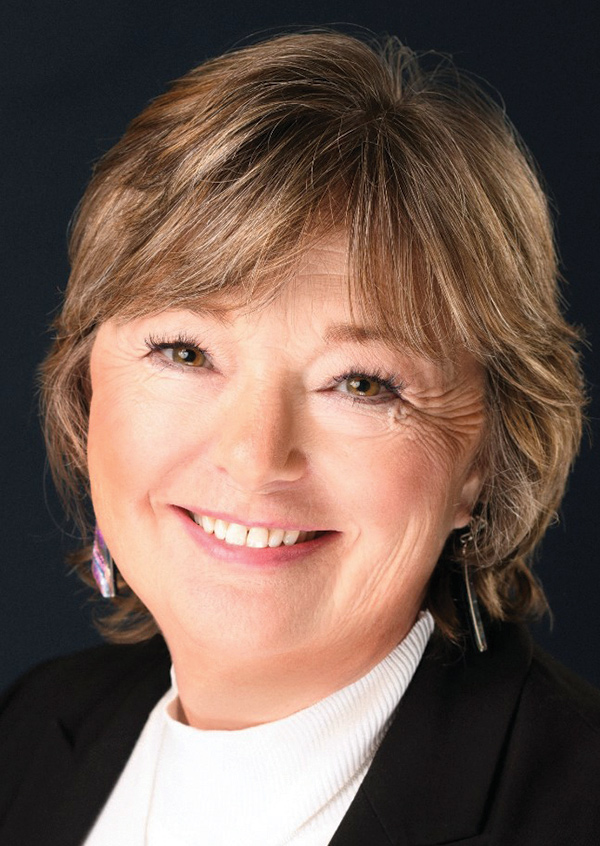 Portrait headshot photo of Tamie Taylor smiling